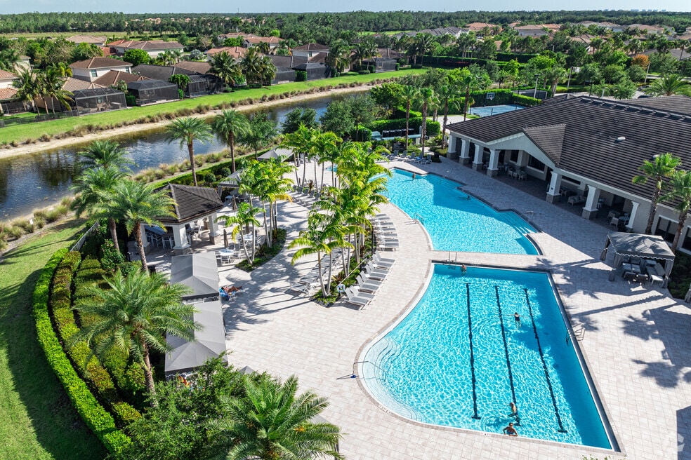 Aerial view of Stonecreek community in North Naples Florida with homes lakes and preserves