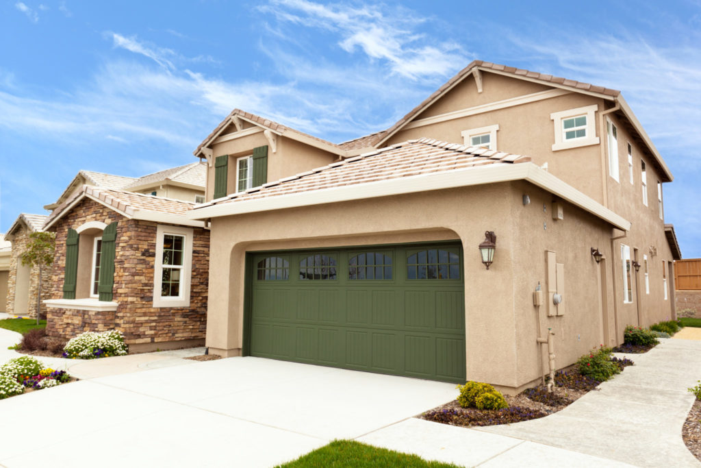 modern-american-suburb-house-green-garage-door-1024x683.jpg