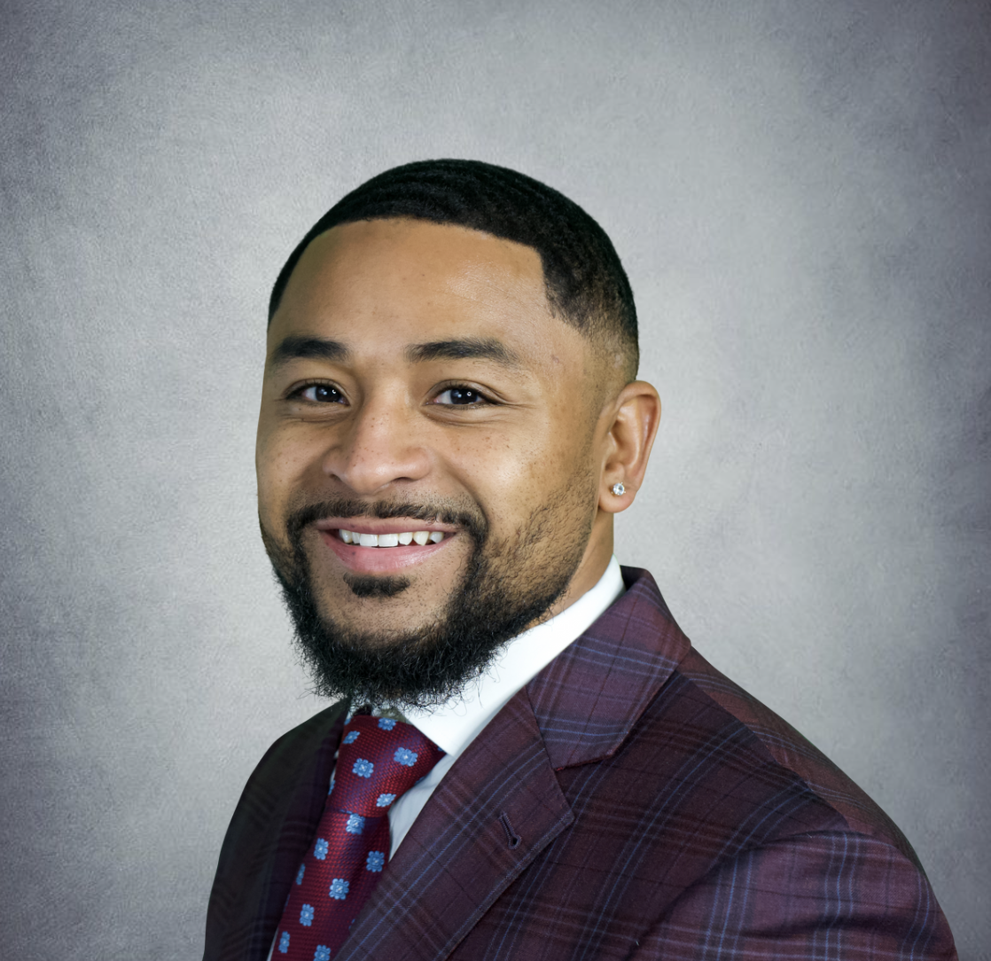 JERICHO JACKSON - Headshot Grey.png