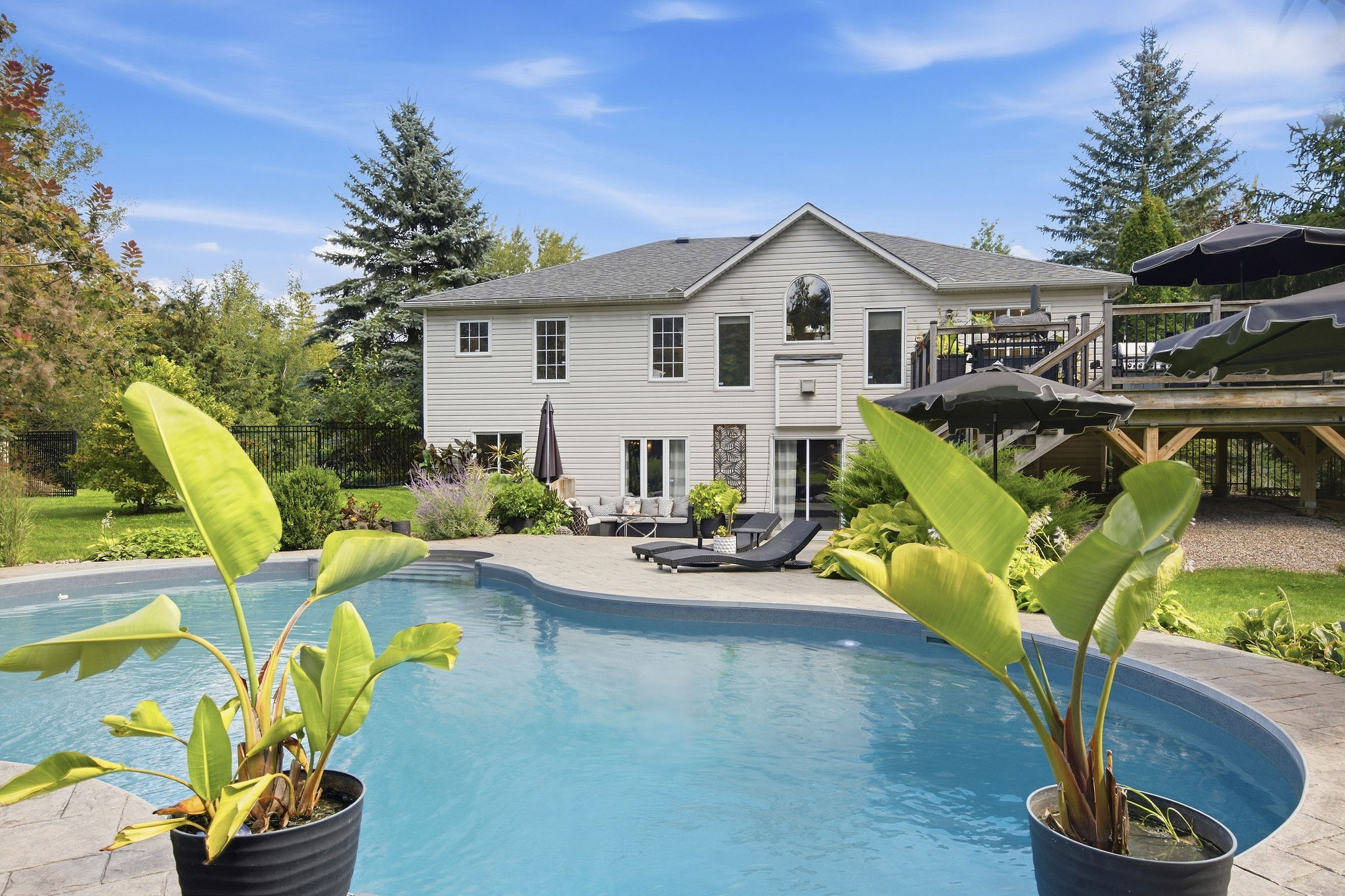 Inground pool, walkout bungalow and two level deck at 8 Sawgrass Circle