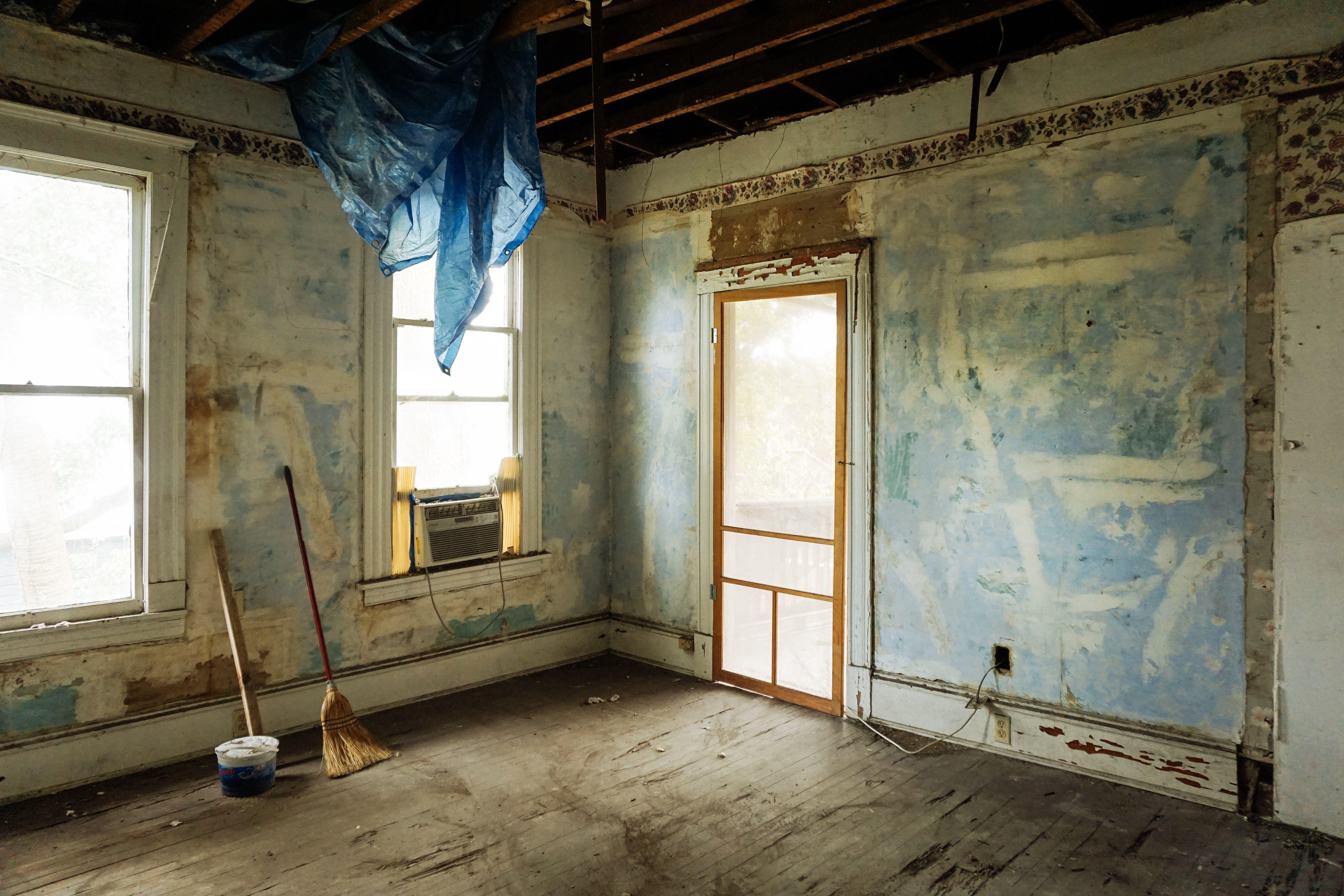 brown-broom-and-white-plastic-bucket-3562689 stripped room.jpg
