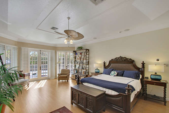 3986 SW Rivers End Way Palm-small-003-22-Master Bedroom-666x444-72dpi.jpg