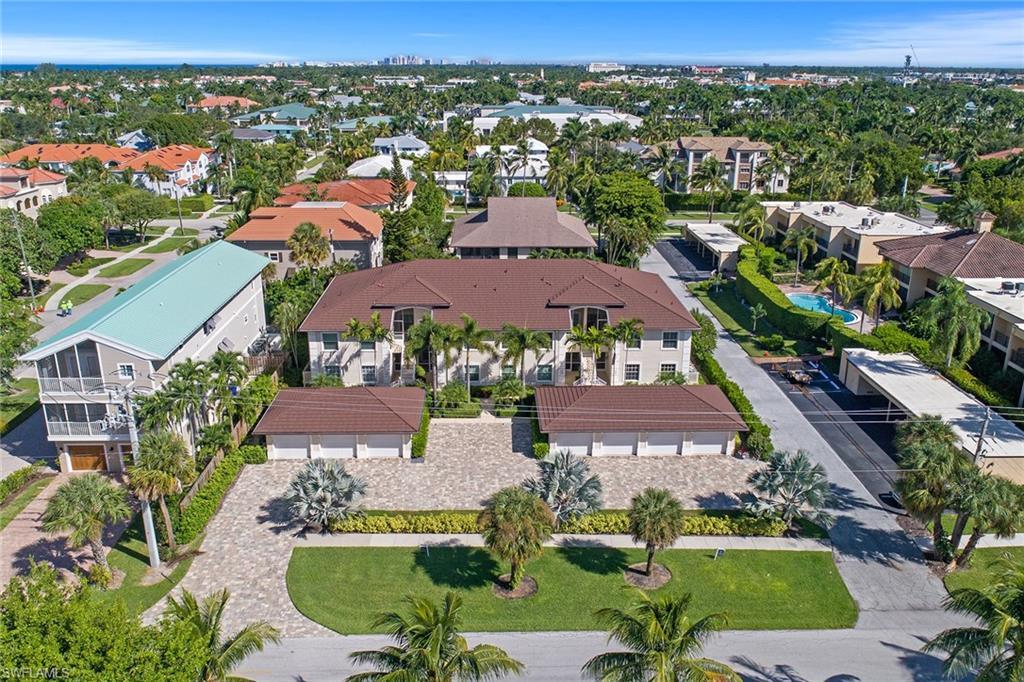 St Charles Olde Naples condominium building and courtyard view