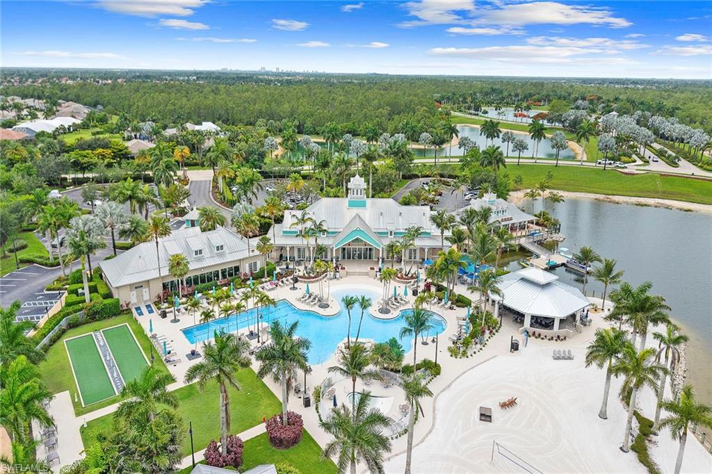 Naples Reserve Island Club resort pool near Canoe Landing homes