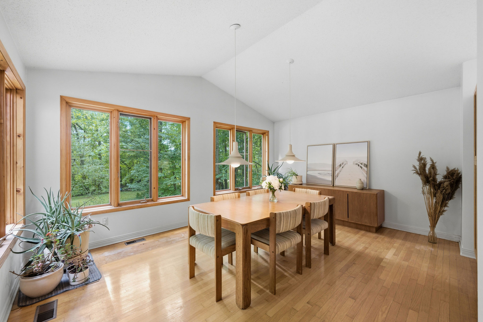 Dining room overlooking the wooded property at 2316 French Hill Road