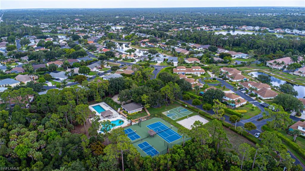Briarwood Naples FL amenities community pools courts lakes and park aerial view