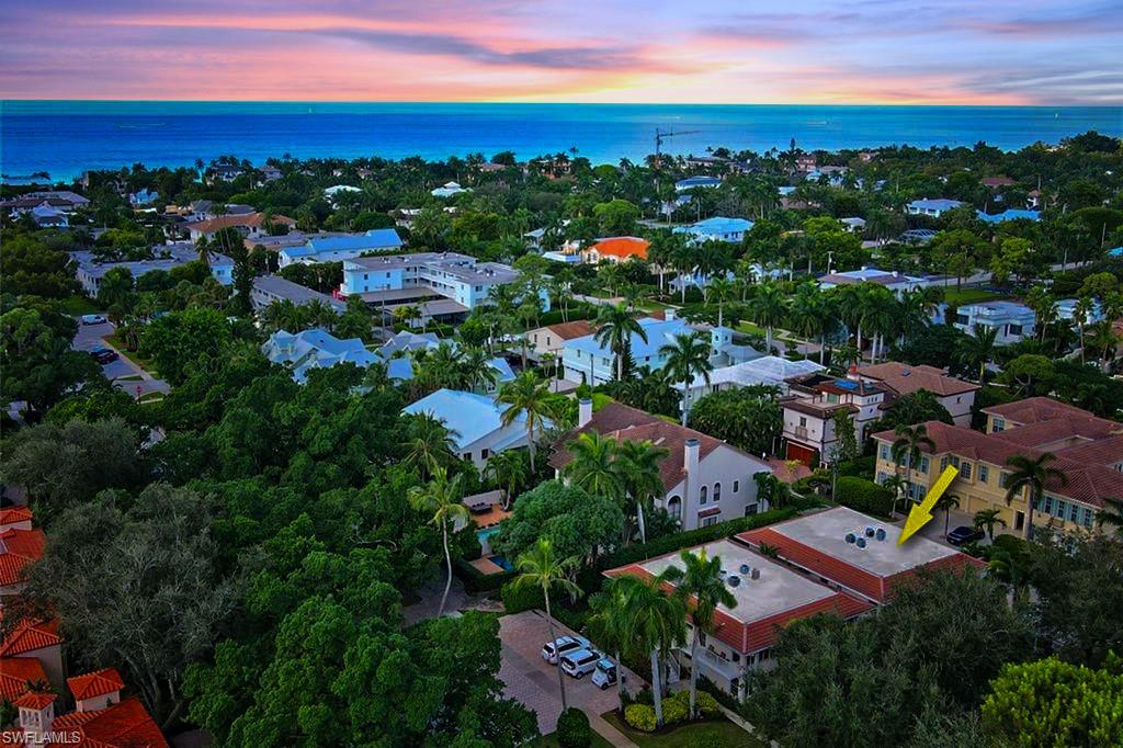 Aerial view of Beach Breeze at Olde Naples Florida showing the condominium location near downtown Naples and Gulf beaches